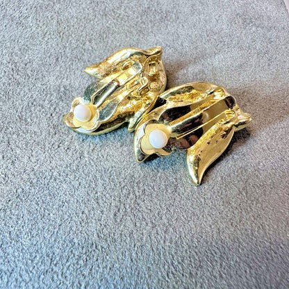 Vintage gold tone leaf shaped rhinestone studded clip on earrings (unmarked)